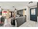 Cozy living room with neutral tones and sliding door access to the patio at 2569 Paradise Village Way, Las Vegas, NV 89120