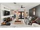 Comfortable living room with sliding door access to the backyard patio at 2569 Paradise Village Way, Las Vegas, NV 89120