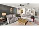 Spacious living room with comfortable seating and decorative wall art at 2569 Paradise Village Way, Las Vegas, NV 89120