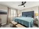 Inviting bedroom featuring a plush bed, soft lighting, and elegant decor at 2569 Paradise Village Way, Las Vegas, NV 89120