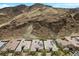 Stunning aerial view showcases houses nestled against the backdrop of picturesque mountains at 26 Costa Tropical Dr, Henderson, NV 89011