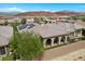 Aerial image shows tile roof and solar panels plus mountain views at 26 Costa Tropical Dr, Henderson, NV 89011