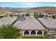 Overhead view of desert home with mountain views and covered patio at 26 Costa Tropical Dr, Henderson, NV 89011