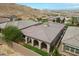 Aerial view of a desert home with a covered patio at 26 Costa Tropical Dr, Henderson, NV 89011