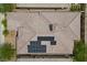 Birds-eye view of desert home showcasing roof with solar panels at 26 Costa Tropical Dr, Henderson, NV 89011