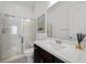 Bright bathroom featuring a glass shower and modern vanity at 26 Costa Tropical Dr, Henderson, NV 89011