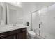 Bathroom featuring a glass enclosed shower, modern vanity and fixtures at 26 Costa Tropical Dr, Henderson, NV 89011