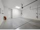 Clean and spacious garage with epoxy flooring and ample room for storage at 26 Costa Tropical Dr, Henderson, NV 89011