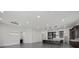 Spacious living area featuring recessed lighting and seamlessly connected to the kitchen, creating an inviting atmosphere at 26 Costa Tropical Dr, Henderson, NV 89011