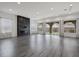Spacious living room features a modern fireplace, large windows, and seamless access to outdoor spaces at 26 Costa Tropical Dr, Henderson, NV 89011