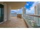 Large tiled balcony with clear glass railing overlooking the cityscape at 2747 Paradise Rd # 2305, Las Vegas, NV 89109