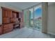 Bright room featuring a large window view, desk, drawers, chair, and light wood floors at 2747 Paradise Rd # 2305, Las Vegas, NV 89109