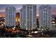 View of the luxury high-rise condos in the city skyline at dusk at 2747 Paradise Rd # 2305, Las Vegas, NV 89109