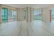 Bright living room with wood floors and large windows offering city views at 2747 Paradise Rd # 2305, Las Vegas, NV 89109