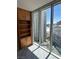 This condo features views of the city from the built in shelving unit and full wall window at 2747 Paradise Rd # 2305, Las Vegas, NV 89109