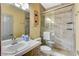 Bathroom featuring glass-enclosed shower with tile surround and single sink vanity at 2808 Cygnus St, Las Vegas, NV 89117