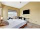 Bedroom showcasing natural light, tiled flooring, and flexible workspace at 2808 Cygnus St, Las Vegas, NV 89117