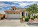 Charming single-story home featuring a two-car garage and desert landscaping in a suburban neighborhood at 2808 Cygnus St, Las Vegas, NV 89117
