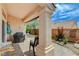 Cozy covered patio with a barbeque grill, perfect for outdoor entertaining at 2808 Cygnus St, Las Vegas, NV 89117