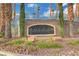 Elegant community entrance sign for Aurora, featuring a stone base and manicured landscaping at 2808 Cygnus St, Las Vegas, NV 89117