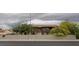 Multi-Gathering building with tan exterior, accessed by outside stairs at 2836 N Pecos Rd, Las Vegas, NV 89115