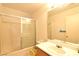 Well-lit bathroom features a shower-tub combination and a mirrored vanity at 2839 Kensington St, Las Vegas, NV 89156