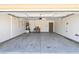 Spacious two-car garage with ample storage space and concrete flooring at 2839 Kensington St, Las Vegas, NV 89156