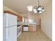 Efficient kitchen with standard appliances and tile floors at 2839 Kensington St, Las Vegas, NV 89156