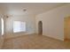 Inviting living room featuring tile floors, bright lighting, and an open floor plan at 2839 Kensington St, Las Vegas, NV 89156
