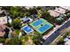 Aerial view of community amenities including tennis and basketball courts, playground, picnic area and lush landscaping at 2846 Barrow Downs St, Las Vegas, NV 89135