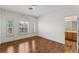 Bright, airy bedroom featuring beautiful hardwood floors and a view at 2846 Barrow Downs St, Las Vegas, NV 89135