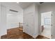Hallway features wood floors and access to bathroom at 2846 Barrow Downs St, Las Vegas, NV 89135