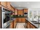 A well-appointed kitchen with stainless steel appliances and granite countertops at 2846 Barrow Downs St, Las Vegas, NV 89135