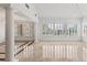Bright living room features marble floors, shuttered windows, and elegant columns creating a grand space at 2846 Barrow Downs St, Las Vegas, NV 89135