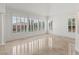 Living room with tile floors, shuttered windows, and bright lighting provides a comfortable living space at 2846 Barrow Downs St, Las Vegas, NV 89135