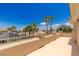 Sun-drenched rooftop patio with palm trees and expansive blue sky views at 2846 Barrow Downs St, Las Vegas, NV 89135