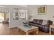 Bright living room with comfortable seating and an open view into the adjacent room at 2913 Laverton Dr, Las Vegas, NV 89134