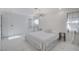 Bright bedroom featuring white walls, marble floors, and modern lighting at 3013 Plaza De Rosa, Las Vegas, NV 89102