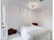 Cozy bedroom with modern lighting, a comfortable bed, and stylish marble floors at 3013 Plaza De Rosa, Las Vegas, NV 89102