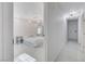 Bright bedroom with white walls, marble floors, and modern lighting at 3013 Plaza De Rosa, Las Vegas, NV 89102