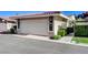 Charming home with a two-car garage and low-maintenance landscaping at 3013 Plaza De Rosa, Las Vegas, NV 89102