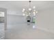 Open-concept living area with stone fireplace and marble floors at 3013 Plaza De Rosa, Las Vegas, NV 89102