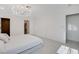 Bright bedroom featuring marble floors, chandelier, and neutral paint at 3013 Plaza De Rosa, Las Vegas, NV 89102