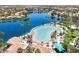 Picturesque community featuring a splash pad, palm trees, and a lake at 3053 Anchor Chain Dr, Las Vegas, NV 89128