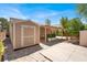 Backyard featuring a shed and landscaping with stone accents at 3053 Anchor Chain Dr, Las Vegas, NV 89128
