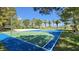 A recreational basketball court with vibrant blue and green colors at 3053 Anchor Chain Dr, Las Vegas, NV 89128