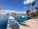 Tranquil view of the community lake showcasing docks, boat rentals, and waterfront homes at 3053 Anchor Chain Dr, Las Vegas, NV 89128