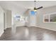 Open-concept living area with ample natural light, sleek flooring, and stylish finishes at 3053 Anchor Chain Dr, Las Vegas, NV 89128