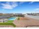 Expansive backyard featuring a pool, spa, and low maintenance landscaping at 341 Waterwheel Falls Dr, Henderson, NV 89015