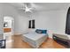 Bright bedroom features a ceiling fan and hard surface floors at 341 Waterwheel Falls Dr, Henderson, NV 89015